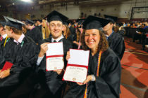 Hunter Caspers '18 and Jessie Cassens '18 showing off their diplomas