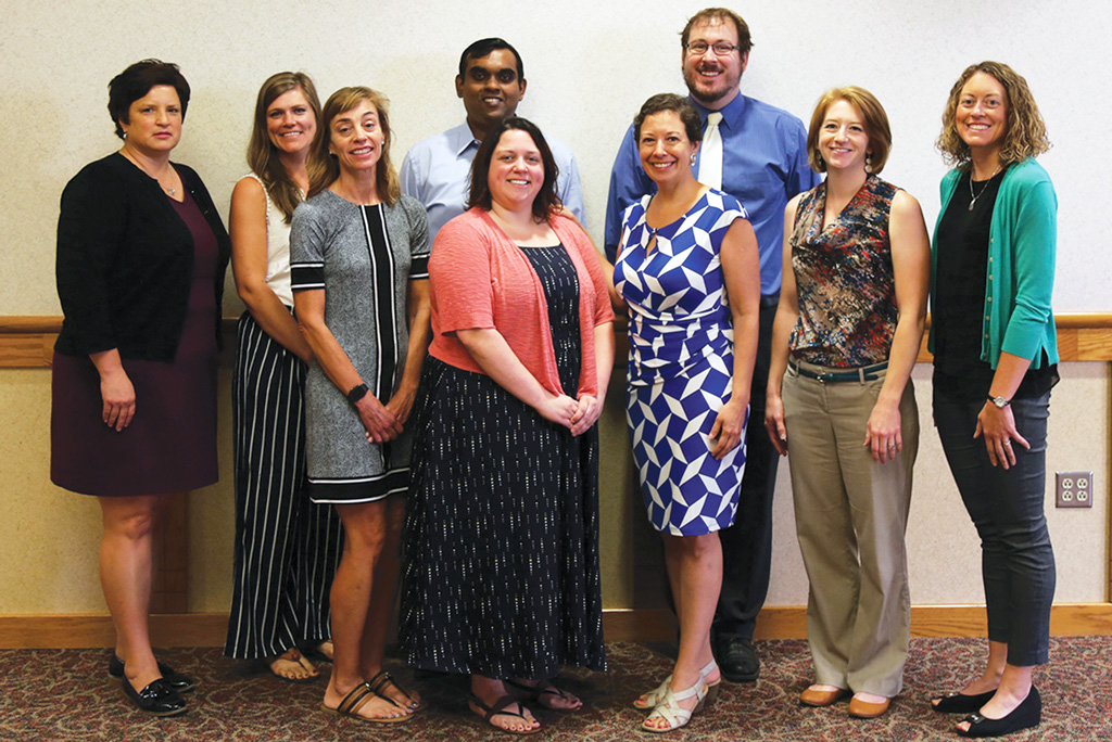 Back row left to right: Leslie Keuning Duinink ’90, in a new role as interim registrar; Jess Klyn de Novelo ’05, in a new role as director of career and professional development; Pavithra Premaratne, assistant professor of physics and engineering; and Alan Hastings, assistant professor of education. Front row, left to right: Julie Summers, lecturer of management and marketing; Morgan Keasler, associate director of career and professional development; Rosa Virginia Mendez, assistant director of study abroad; Dana Berggren, assistant director of community-based learning; and Amanda Clark, instructor of education.