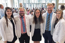Five Central graduates celebrated together at the University of Iowa white coat ceremony earlier this year. Left to right: Ashley Radig ’16, Sam Palmer ’17, Abby Fyfe ’18, Nick Lind ’06 and Andie Arthofer ’17.