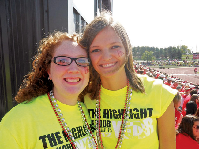 Roommates Alison Redman Westfall ’13 and Sarah Rankin Folkerts ’13 at a Central College Dutch football game during their student days.