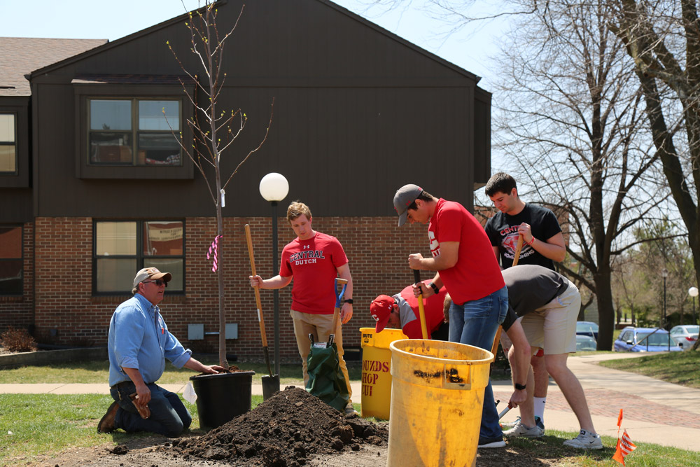 Students planting a tree on Arbor Day 2018