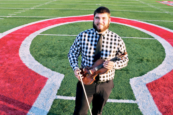 Ed Henning ’20 grew up on a farm near Hartwick, Iowa, population 79. He appreciates he can continue to play both classical violin and football at Central. “Every college you visit, they all say they’re like a family. But Central was the only one that really felt like that,” he says.