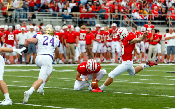 Jon Alberts ’20 kicking a field goal during a game against Loras College.