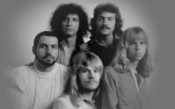 The members of Styx, after Tommy Shaw joined the band, are shown in a 1970s promotional photo, clockwise from far left: Chuck Panozzo, John Panozzo, Dennis DeYoung, Shaw and James "JY" Young.