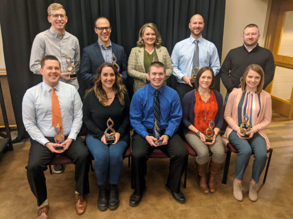 Dan Huitink ’04 (back row, second from left), Brent Gaulke ’02 (front row, far left), Hannah Wallace Vander Veer ’16 (front row, far right) and Kris Wolthuizen Van Gent ’15 (back row, far left) 