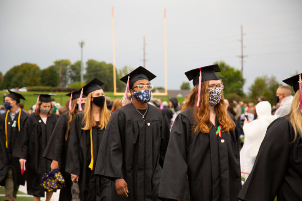 Students walk into Ron and Joyce Schipper Stadium for Commencement on Sunday, Sept. 27.