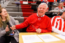 Thom Summitt ’74 jokes with former Central volleyball player Erin Dilger ’20 prior to a Dutch men’s basketball game. Summitt, a longtime favorite of Central student-athletes, retired as the men’s and women’s basketball announcer in February after 30 years. He previously announced at home volleyball and softball contests as well.