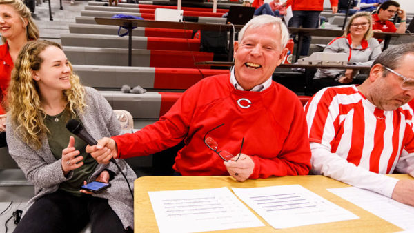 Thom Summitt ’74 jokes with former Central volleyball player Erin Dilger ’20 prior to a Dutch men’s basketball game. Summitt, a longtime favorite of Central student-athletes, retired as the men’s and women’s basketball announcer in February after 30 years. He previously announced at home volleyball and softball contests as well.