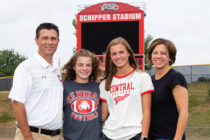 Jeff McMartin’90,(left), along with his daughters, Emily and Caroline ’24, and wife Laurie Rieken McMartin ’90.