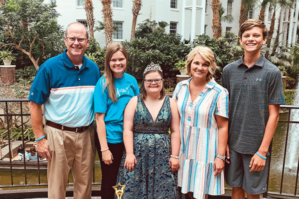 Bella Van Gorp (center), shown here with her family, won the first runner up trophy at the Miss Amazing national summit in Summer 2021. Miss Amazing is a nonprofit organization that provides opportunities for girls and women with disabilities to build confidence and self-esteem.