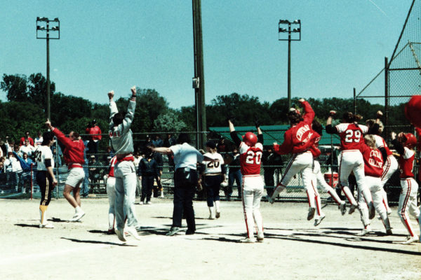 A delayed call at home plate with two outs in the bottom of the seventh inning gave Central a thrilling come-from-behind 3-2 walkoff NCAA softball title winner over Allegheny College (Pa.) in 1988 in Elmhurst, Illinois. Coach George Wares (left), Brenda Vigness Coldren ’89 (#20), Laurie Sutten Flynn ’88, Diane Pitz Magnani ’89 (#29) and the rest of the Dutch start the celebration.