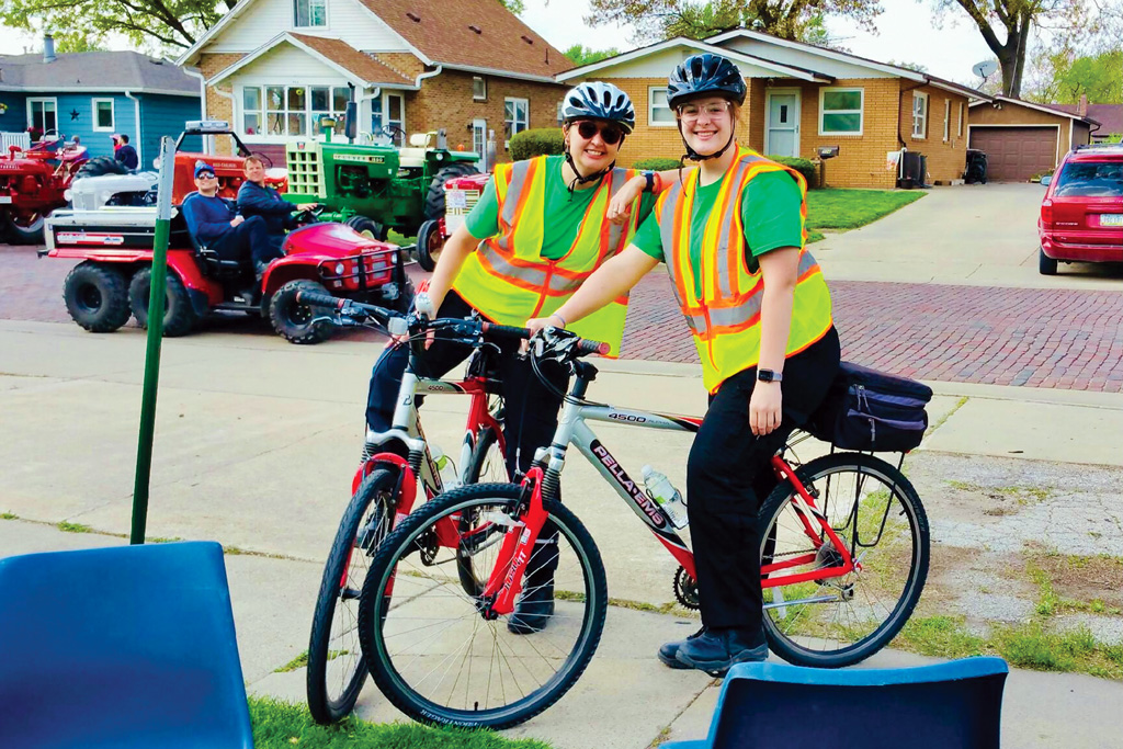 Sarah Fosdick Turnbull ’00, far left, and her colleague served “Dutch style” on EMS bikes during Tulip Time.