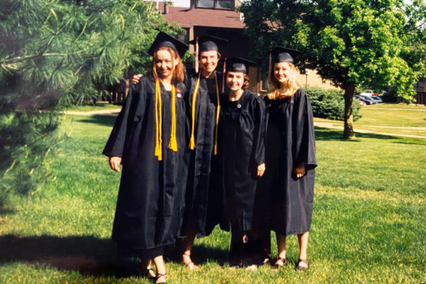 Sarah Fosdick Turnbull ’00, far left, poses with friends after graduation from Central College in May 2000.