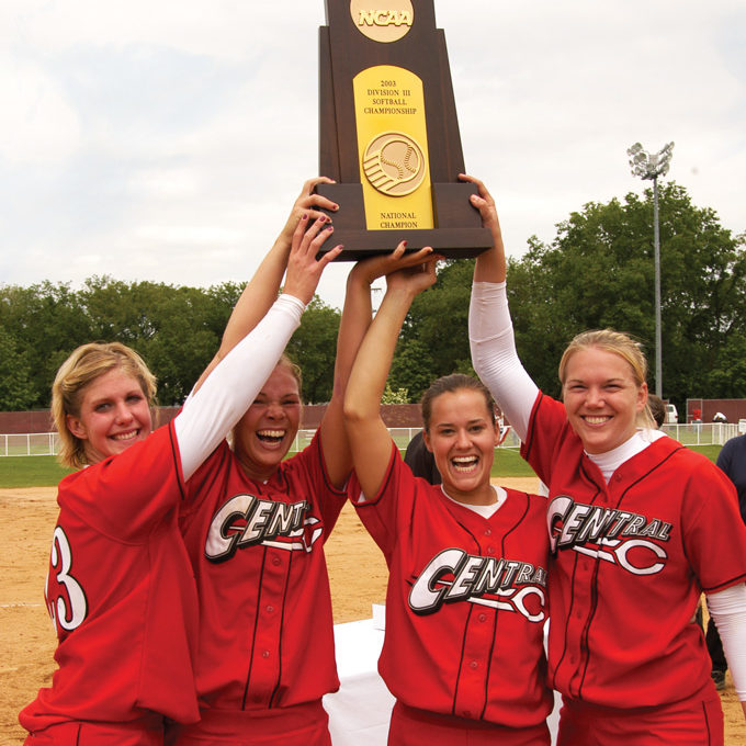 The 10th NCAA Division III Championship trophy won by a Central women’s team was hoisted in 2003 by softball captains Libby Hysell Carlton ’03, Mary Vande Hoef ’03, Kris Hughes Gardner ’03 and April Miller Hicks ’03 in Salem, Virigina.