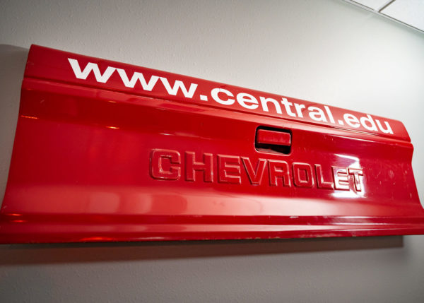 Long before electric vehicles were the trend, Central fleet staff converted a Chevrolet truck to electric power. The tailgate from that early 1980s truck is a tribute to Central’s creative staff.