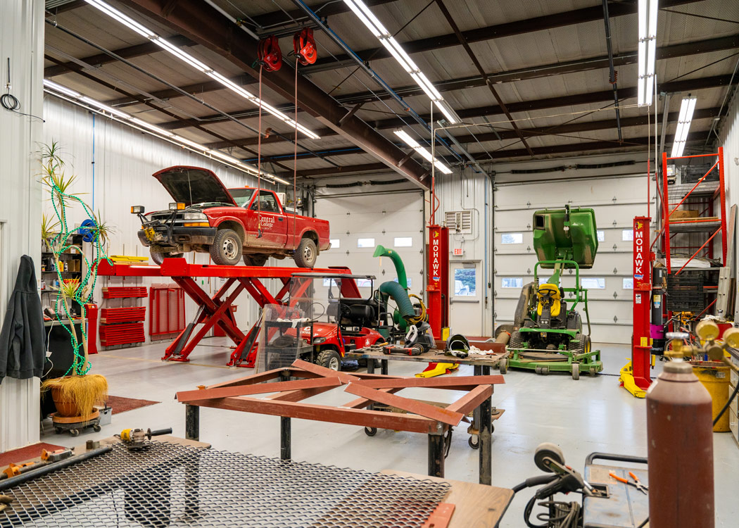 A fleet of more than 40 vehicles, including diesel buses, requires constant maintenance to always be ready to take a team to competition or a field trip to the prairie.