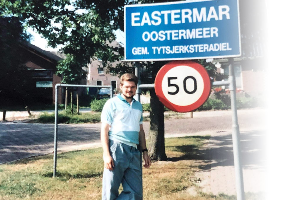 John Lucas '92 poses with a road sign for Easermar (Dutch: Oostermeer), a village in Tytsjerksteradiel municipality in the province Friesland of the Netherlands.