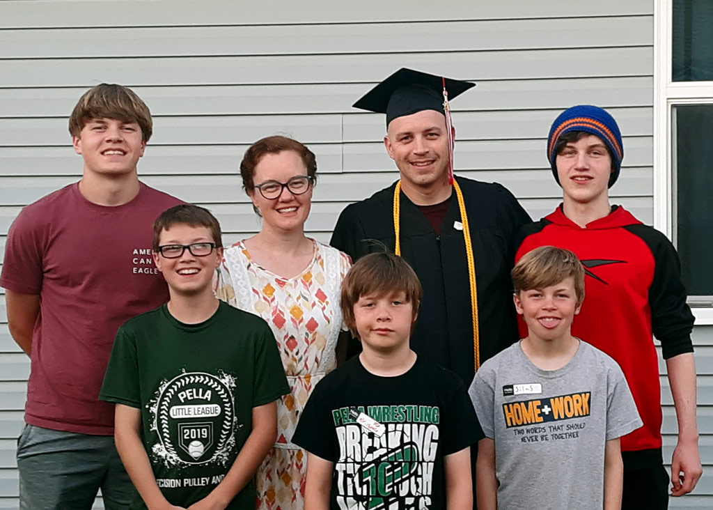 After the pomp and circumstance from Commencement ended, the Vande Kieft family celebrated Shawn’s achievement together. Pictured at their home (left to right) front: Noah, Ephraim and Silas. Back: Gideon, Hillary, Shawn and Elijah.
