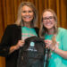 Jen Diers, director of the education program at Central College, and Kinsley Parrott ’21, founder and president of Packs for a Purpose, Inc., proudly present one of the nonprofit’s packs.