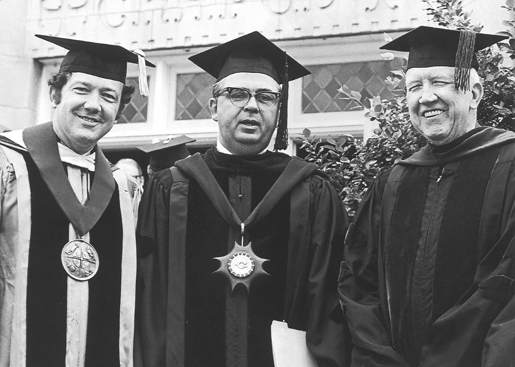 Former Central College Presidents Arend D. “Don” Lubbers, Ken Weller and Irwin Lubbers share a moment outside Central Hall.