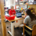 Tammy Strawser, lecturer of education, meets with a student in her office.